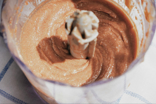 A blender full of homemade peanut butter.